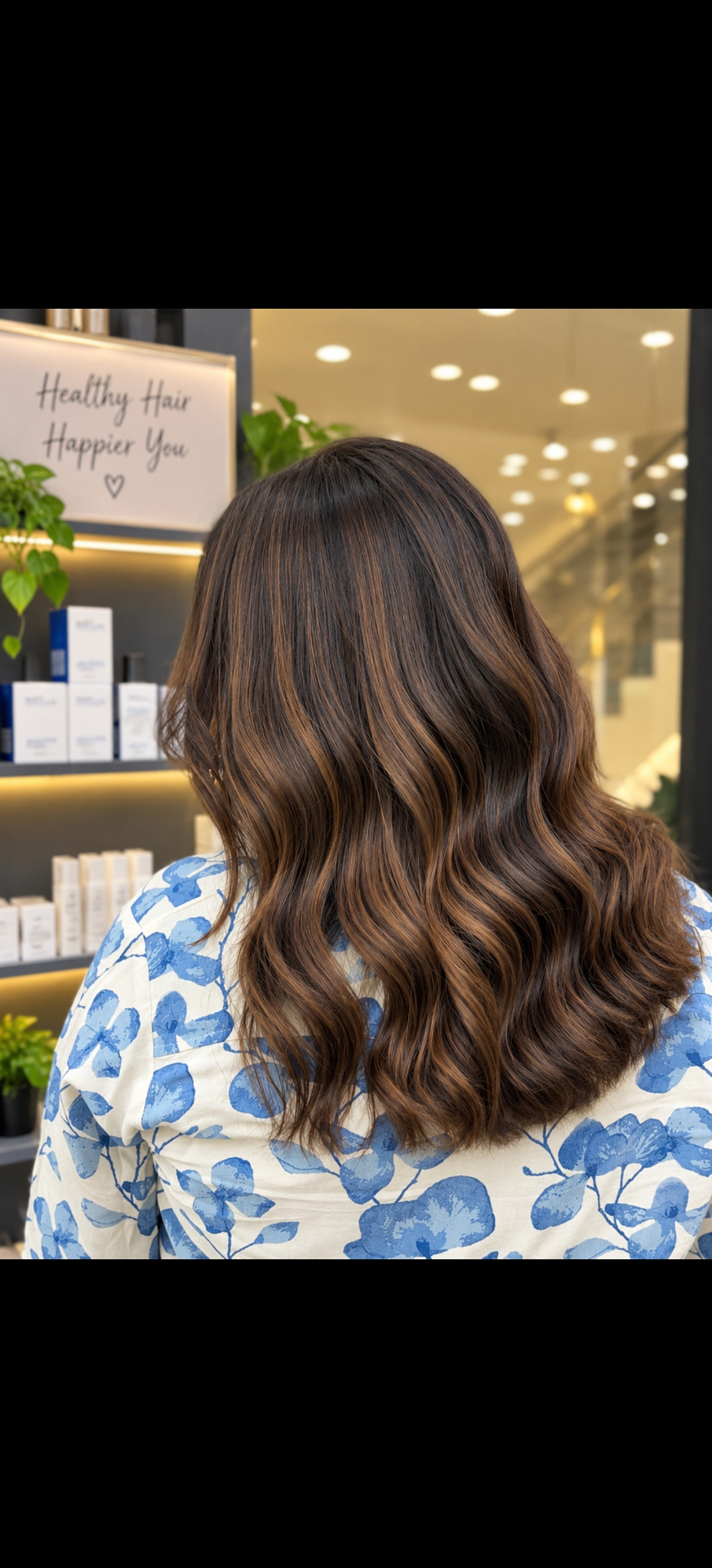 Dimensional brunette colour styled in relaxed waves